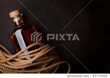 Bottle with rum Bottle with rum 87775958