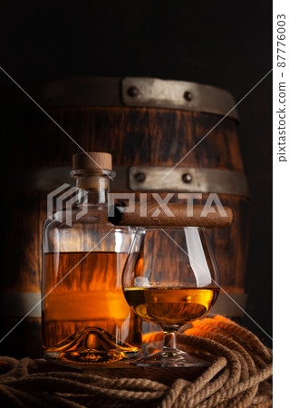 Glass and bottle with cognac Glass and bottle with cognac 87776003