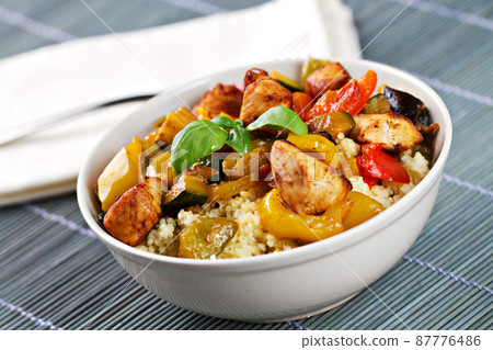 CousCous Bowl whit Meat and Mixed Grilled Vegetables CousCous Bowl whit Meat and Mixed Grilled Vegetables 87776486