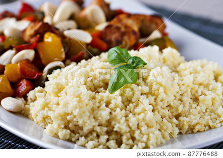 CousCous Bowl whit Meat and Mixed Grilled Vegetables CousCous Bowl whit Meat and Mixed Grilled Vegetables 87776488