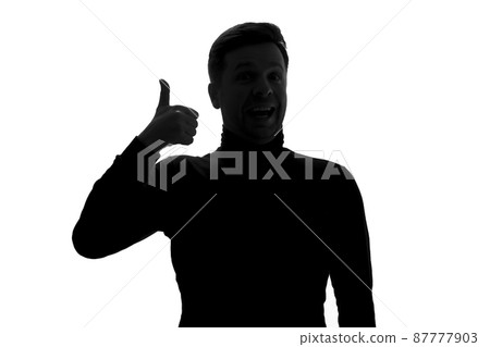 Silhouette of man showing thumbs up giving positive feedback, Silhouette of man showing thumbs up giving positive feedback, 87777903