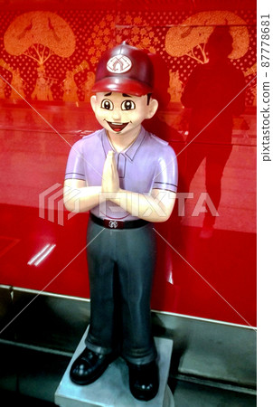 Smiling child statue with folded hands symbolizes the traditional Indian greeting Namaste at lucknow metro station 87778681