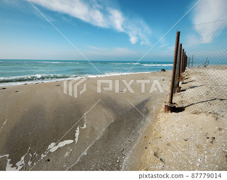 Sandy coast of the Caspian Sea. Sandy coast of the Caspian Sea. 87779014