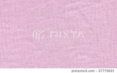 Beautiful knitted carnation wool textiles as a background. Beautiful knitted carnation wool textiles as a background. 87779685