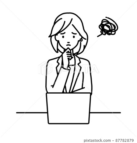 一個穿西裝的女人坐在辦公桌前打開電腦 一個穿西裝的女人坐在辦公桌前打開電腦 87782879