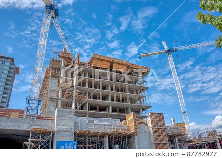 Concrete high rise residential building under constraction 87782977