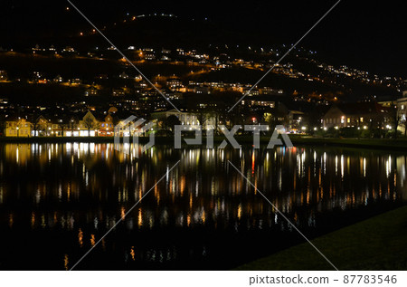 Pond near Bergen station in Norway (night) 87783546