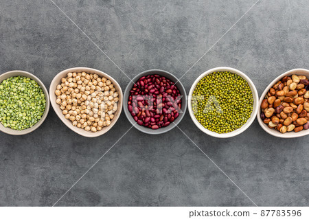 Different types of legumes in bowls 87783596