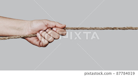 man pulling a rope, web banner format man pulling a rope, web banner format 87784019