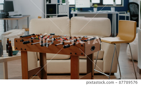Empty office prepared for drinks and snacks after work Empty office prepared for drinks and snacks after work 87789576