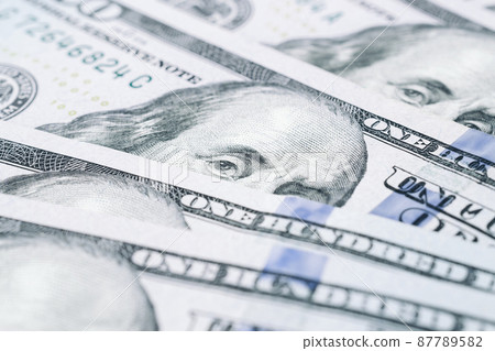Us dollar. American money, falling cash. Hundred dollars isolated on white background. Us dollar. American money, falling cash. Hundred dollars isolated on white background. 87789582