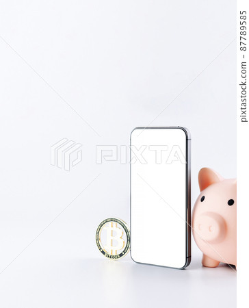 Smart phone mockup crypto money app. Pig bank with golden bit coin, mobile smartphone mockup. Save money concept. 87789585