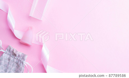 Menstrual cycle sanitary cup. Pink ribbon with menstrual cup. Menstruation feminine period. Sanitary hygiene banner. Use menstrual cup inside vagina. Menstrual cycle sanitary cup. Pink ribbon with menstrual cup. Menstruation feminine period. Sanitary hygiene banner. Use menstrual cup inside vagina. 87789586