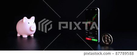 Exchange bitcoin. Gold crypto currency BTC bitcoin, pink pig bank on black background. Crypto currency exchange mobile phone app. Virtual online business concept. Exchange bitcoin. Gold crypto currency BTC bitcoin, pink pig bank on black background. Crypto currency exchange mobile phone app. Virtual online business concept. 87789588