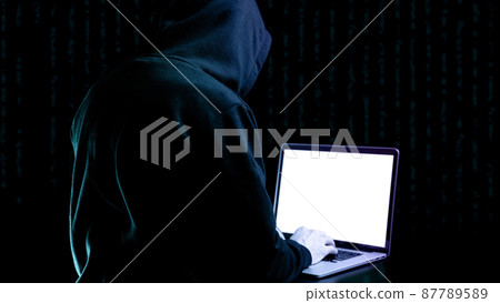 Cyber security hacker concept. Internet web hack technology. Digital laptop in hacker man hand isolated on black banner. Data protection, secured internet access, cybersecurity. 87789589