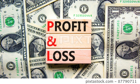 P and L profit and loss symbol. Concept words P and L profit and loss on wooden blocks on a beautiful background from dollar bills. Business and P and L profit and loss concept. Copy space. P and L profit and loss symbol. Concept words P and L profit and loss on wooden blocks on a beautiful background from dollar bills. Business and P and L profit and loss concept. Copy space. 87790711