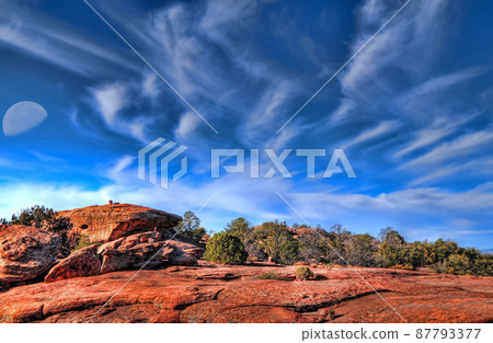 Top of a desert mountain and moon 87793377