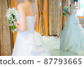 Bride in a wedding dress with a bouquet of bouquets 87793665