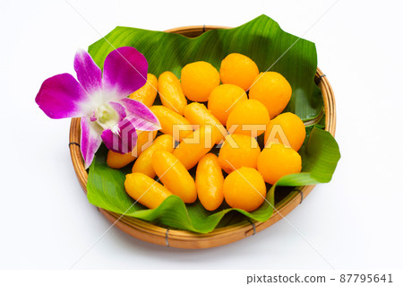 Traditional Thai desserts. "Med Kanoon" with "Thong Yod" 87795641