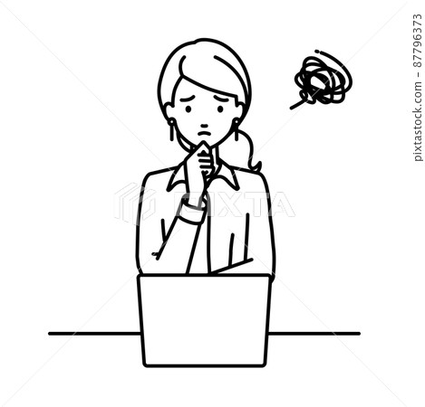 A woman in a blouse sitting at a desk and opening her PC A woman in a blouse sitting at a desk and opening her PC 87796373