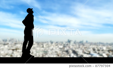 仰望天空的男性剪影_城市背景_寬 仰望天空的男性剪影_城市背景_寬 87797304