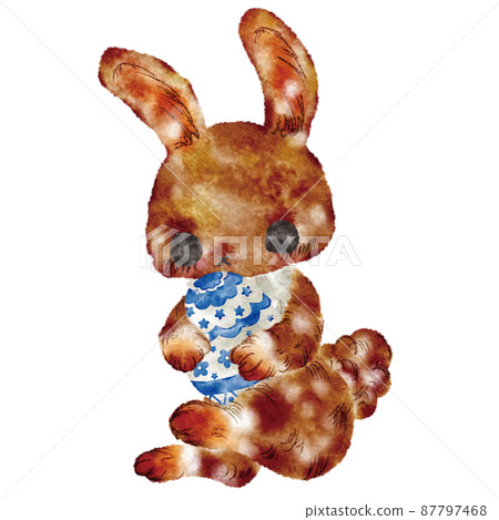 Rabbit holding an egg Rabbit holding an egg 87797468