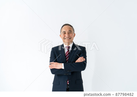 Businessman senior portrait looking at the camera Businessman senior portrait looking at the camera 87798482