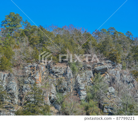 Beautiful Rock Wall in Beavers Bend State Park along the edge of the forest, Broken Bow, Oklahoma Beautiful Rock Wall in Beavers Bend State Park along the edge of the forest, Broken Bow, Oklahoma 87799221