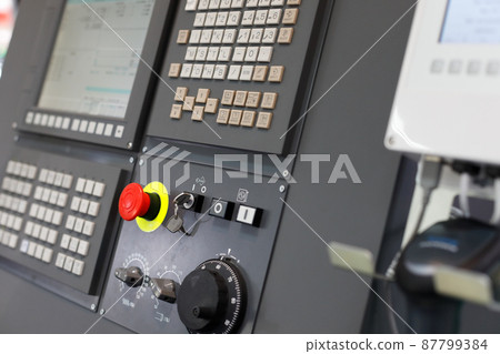 CNC control panel of a machining center close up CNC control panel of a machining center close up 87799384