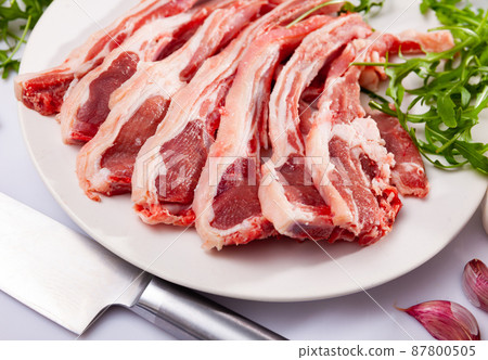 Chops of fresh raw lamb ribs Chops of fresh raw lamb ribs 87800505