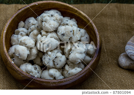 Thai Shortbread Cookies (Thai Dessert), Kanom Kleeb Lum Duen on burlap fabric background. 87801094