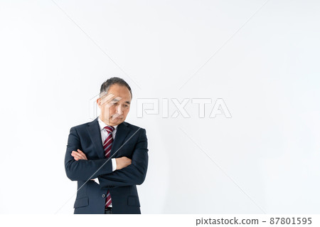 Business worried senior arms folded Business worried senior arms folded 87801595