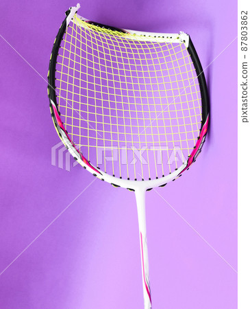 Unused badminton shuttlecocks and broken string racket on the floor of indoor badminton court, concept for badminton lovers around the world. Unused badminton shuttlecocks and broken string racket on the floor of indoor badminton court, concept for badminton lovers around the world. 87803862