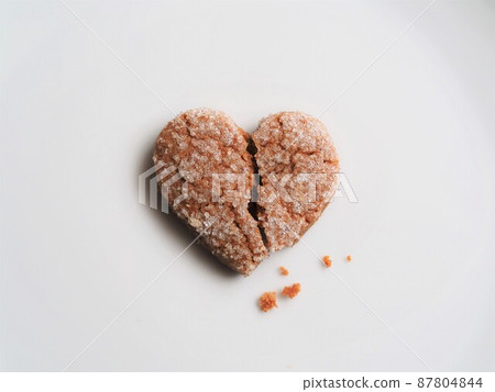 Broken heart-shaped cookie 87804844