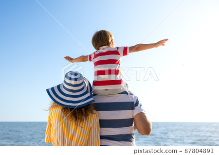 Happy family having fun on summer vacation Happy family having fun on summer vacation 87804891