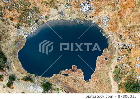 Lake Nesamovite mountain lake of the Ukrainian Carpathians, a lake in autumn. Lake Nesamovite mountain lake of the Ukrainian Carpathians, a lake in autumn. 87806015