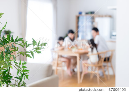 Young family eating 87806403