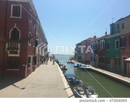 Colorful and fashionable Burano island surrounded by the sea Colorful and fashionable Burano island surrounded by the sea 87808069