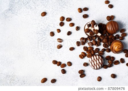 Various chocolate praline candies assortment close up 87809476