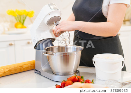 modern immersion mixer in the kitchen for baking and desserts.  87809985