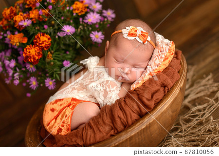Close-up beautiful sleeping baby girl. Newborn baby girl, asleep Close-up beautiful sleeping baby girl. Newborn baby girl, asleep 87810056