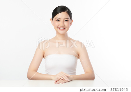 Beautiful young asian woman with clean fresh skin on white background, Face care, Facial treatment, 87811943