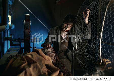 Ugly man with zombie greasepaint on face 87813688