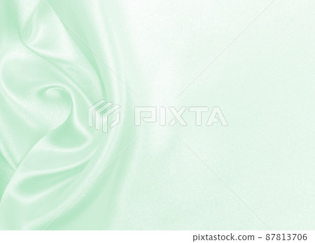 Smooth elegant green silk or satin luxury cloth texture as abstract background. Luxurious background design Smooth elegant green silk or satin luxury cloth texture as abstract background. Luxurious background design 87813706