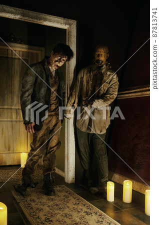 Zombie house with candlelight and scary corpse Zombie house with candlelight and scary corpse 87813741
