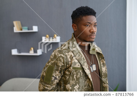 War veteran looking out window War veteran looking out window 87813766
