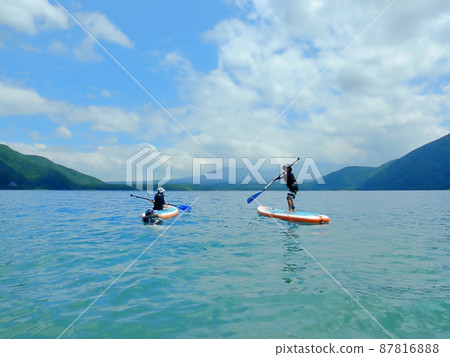 Children enjoying SUP Lake Motosu 87816888
