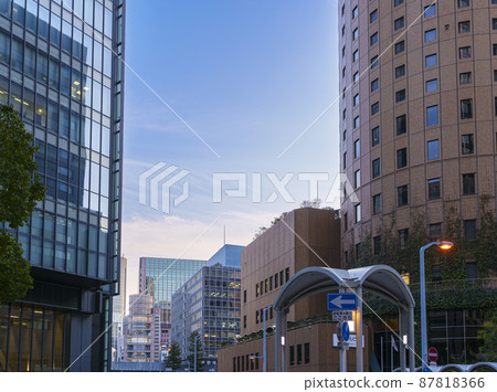 Near the intersection in front of Osaka Station, Osaka / Umeda cityscape, evening view Near the intersection in front of Osaka Station, Osaka / Umeda cityscape, evening view 87818366