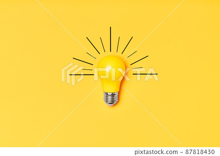 Concept creative idea with lightbulb on yellow background 87818430