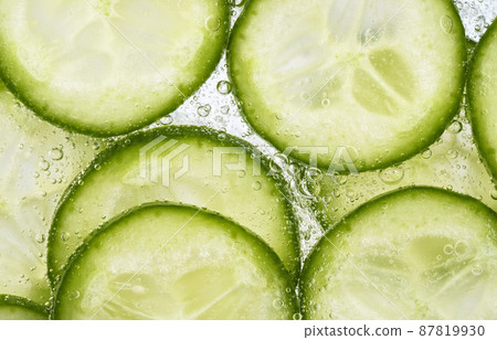 Slices of Cucumber in Water with Bubbles 87819930